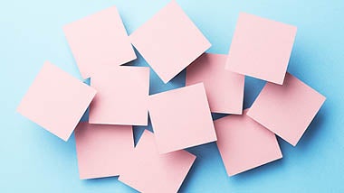 post it notes behind contractor hiring advice text